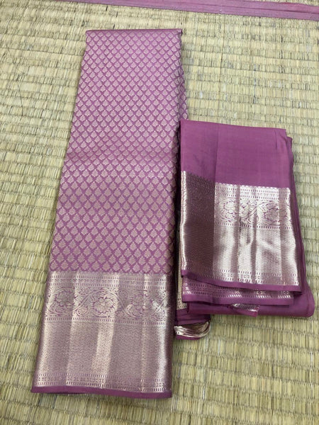 KSS305 Equisite Kanjivaram Pure Silk Brocade Saree In Mauve. Fall Peco done. Comes with stitched blouse size: 38 to 46. SILK MARK CERTIFIED