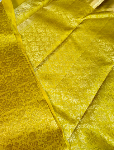 KSS307 Equisite Kanjivaram Pure Silk Brocade Saree In Yellow. Fall Peco done. Comes with stitched blouse size: 38 to 46. SILK MARK CERTIFIED