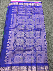 SKH141 PURE GADWAL HANDLOOM SILK SAREE IN GREEN  WITH BLUE ZARI BORDER AND PALLU