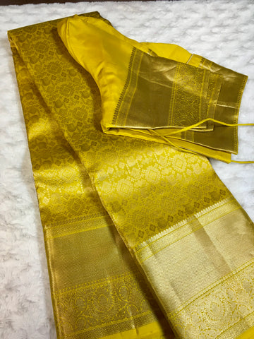 KSS307 Equisite Kanjivaram Pure Silk Brocade Saree In Yellow. Fall Peco done. Comes with stitched blouse size: 38 to 46. SILK MARK CERTIFIED