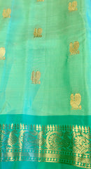 PURE GADWAL HANDLOOM SILK SAREE IN PASTEL GREEN WITH TEAL ZARI BORDER AND PALLU