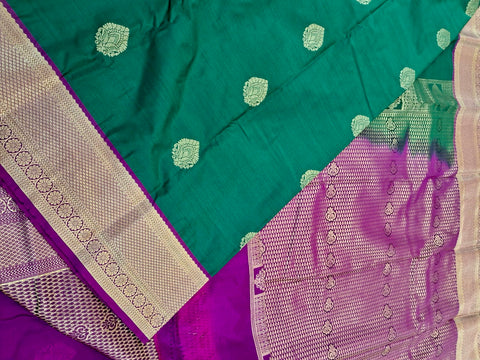 KSS340 Kanjivaram Semi Silk Saree In Dark Green w/ Magenta Border. Fall Peco done. Comes w/ stitched blouse size: 38 to 46.