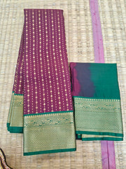 KSS344 Kanjivaram Semi Silk Saree In Maroon w/ Bottle Green Border. Fall Peco done. Comes w/ stitched blouse size: 38 to 46.