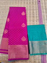 KSS345 Kanjivaram Semi Silk Saree In Rani Pink w/ Gold Border. Fall Peco done. Comes w/ stitched blouse size: 38 to 46.