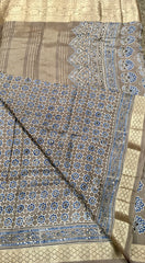 PURE MODAL SILK ZARI BORDER SAREE IN GRAY WITH INDIGO AJRAKH PRINT