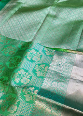 KSS304 Equisite Kanjivaram Pure Silk Brocade Saree In Light Green. Fall Peco done. Stitched blouse size: 38 - 46. SILK MARK CERTIFIED