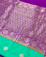 KKT116 PURE BANARASI HANDLOOM KATAN SILK SAREE IN GREEN WITH PURPLE ZARI BORDER AND PALLU