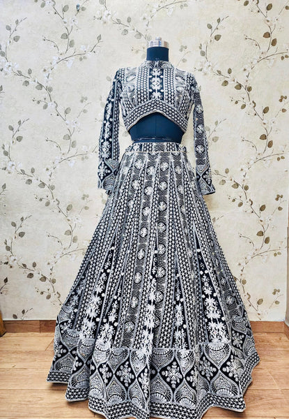 AFL1053-Georgette Lehenga in Black comes with chikankari and multi color embroidery and  with Net Dupatta. Also Comes with a matching stitched blouse.