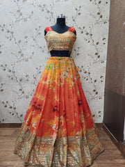 AFL1033 - Chiffon Lehenga in yellow with digital floral print comes with sequence and zari embroidery work and with Net Dupatta. Also Comes with a matching stitched blouse.