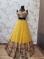 AFL1044-Georgette Lehenga in yellow comes heavy embroidery work on border  and with Net Dupatta. Also Comes with a matching stitched blouse.