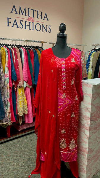 RFSS1636- Pure bandej suit in pink orange color with hand gota work. comes with silk pants and dupatta.