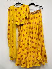 RFSS1016 - Muslin Silk Lehenga in Yellow with embroidery on Belt. Comes with Yellow Crop top and Dupatta.
