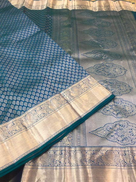 KSS302 Equisite Kanjivaram Pure Silk Brocade Saree In Blue. Fall Peco done. Comes with stitched blouse size: 38 to 46. SILK MARK CERTIFIED