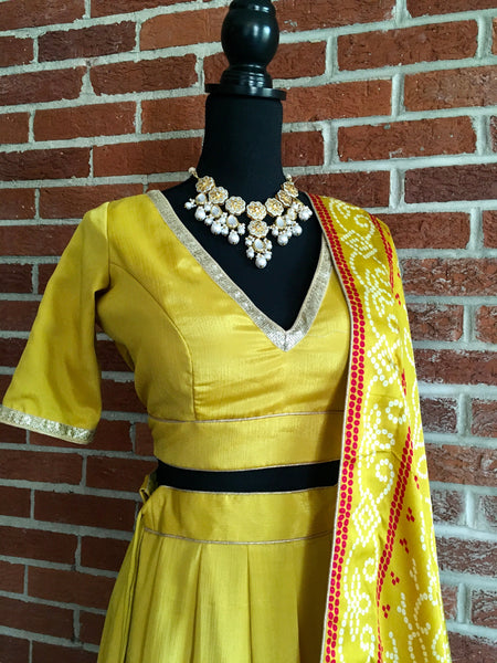 AFL1008 - Raw Silk Lehenga with pure gajji silk  Dupatta with digital Bandhej prints. Comes with stitched blouse