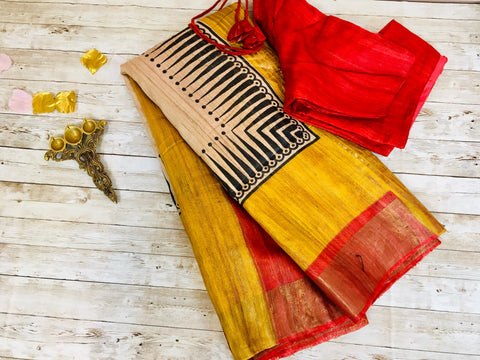 KSP211 - pure zari tussar saree in beige with yellow border.Comes with stitched blouse size 38,can be altered to 42