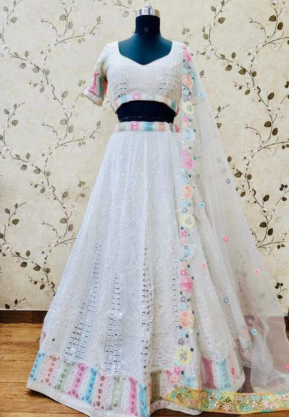AFL1029 - Gerogette Lehenga in White with sequins and floral embroidery work and with Net Dupatta. Also Comes with a matching stitched blouse.