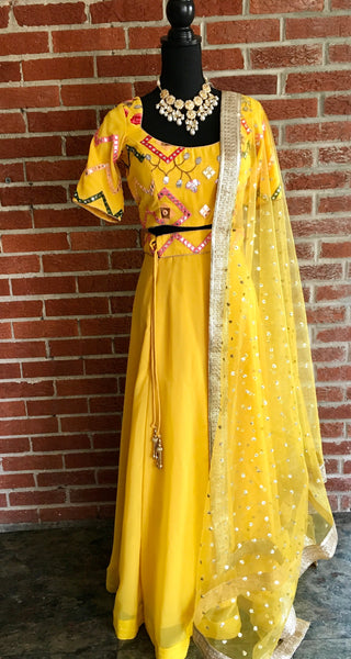 AFL1011 - Pure Gerogette Lehenga comes with net Dupatta Sequence embroidery work. Comes with matching stitched blouse having gota and thread  with foil mirror work.